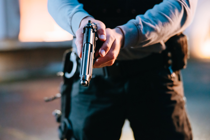 police officer with a gun